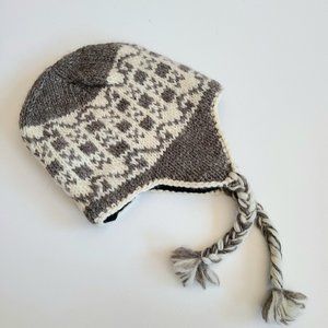 100% wool knitted girls hat with fleece lining.